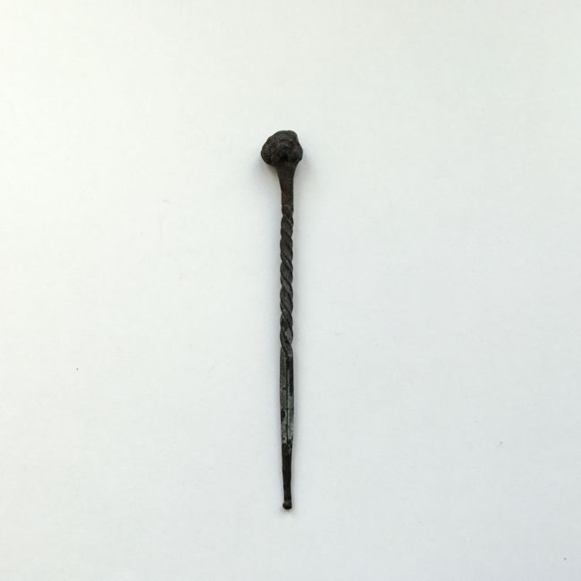 Römische Haarnadel mit Frauenkopf