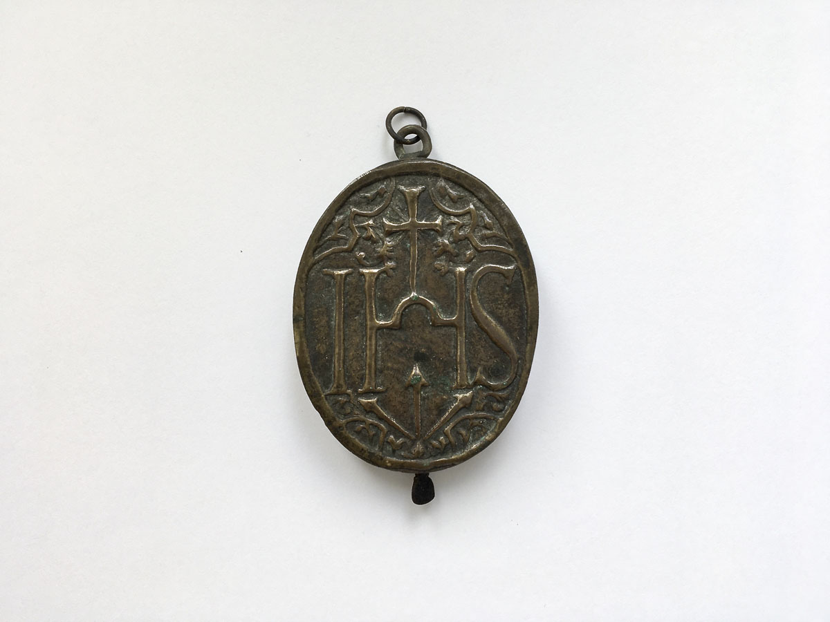 Reliquienkapsel IHS mit 5 Reliquien - 18. Jahrhundert